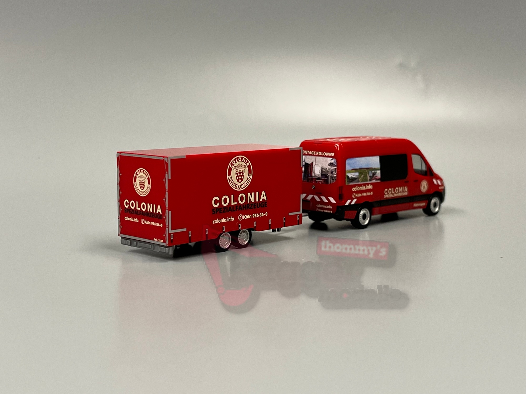098618 - Herpa - Mercedes-Benz Sprinter `18 Halbbus mit Tandemanhänger "Colonia"